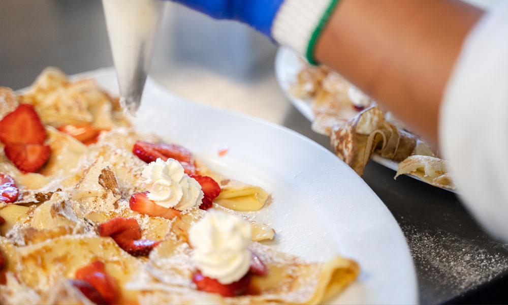 Delicious food being prepared in the dining commons